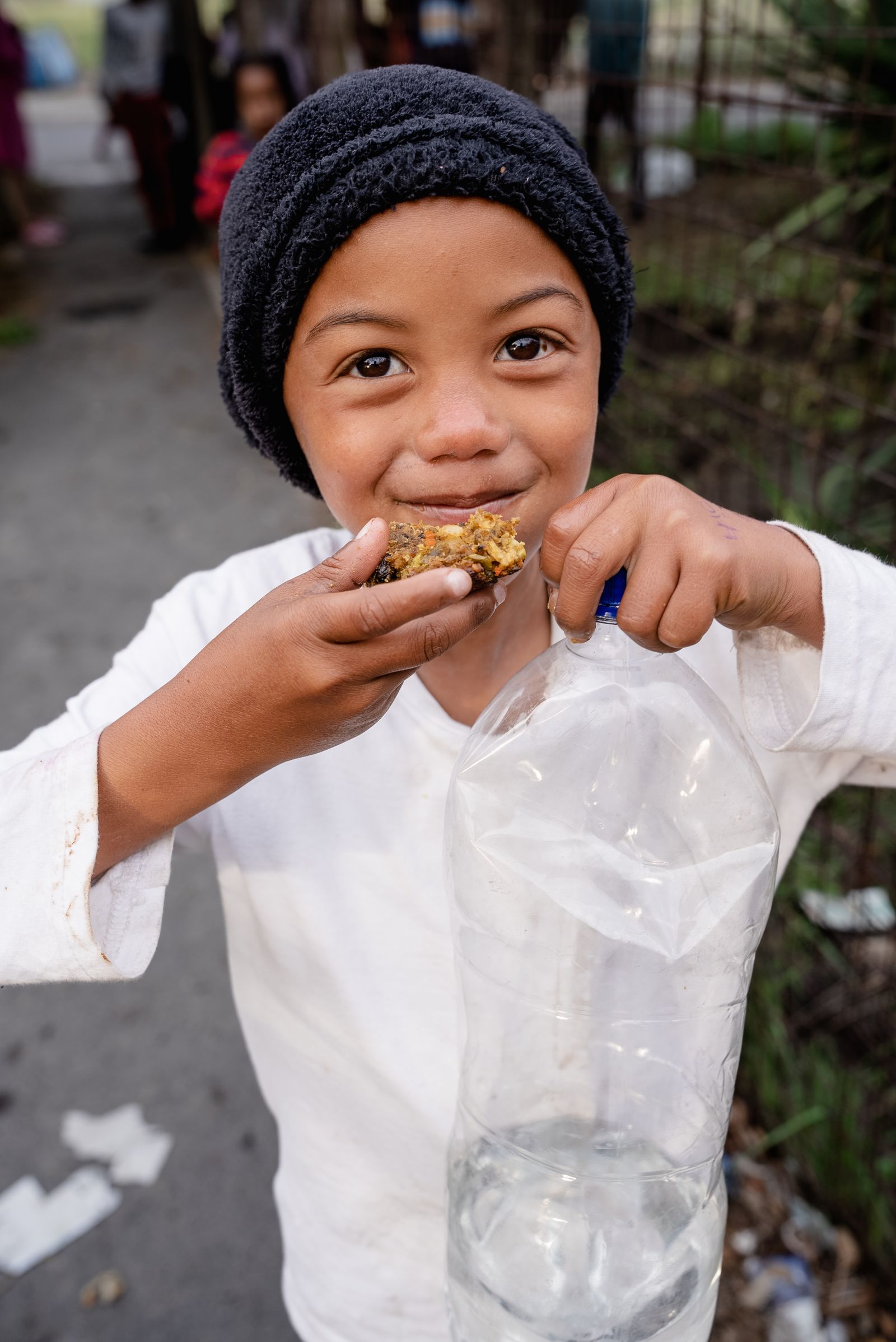 A snack break at a community day with the children